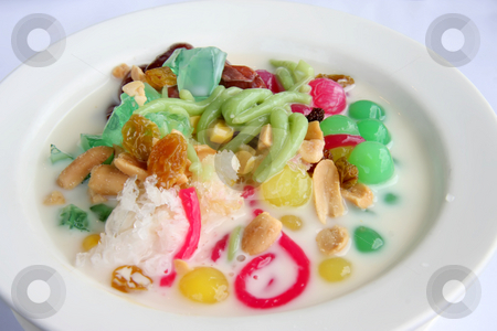 To use this stock image in your creative project, please select the size you need over to the right and click the "Add to Cart" button.
Your downloaded image will come with the Cutcaster watermark removed so don’t worry about the watermark you see on this page. Shaved ice dessert stock photo, Asian shaved ice dessert with colorful jelly by Kheng Guan Toh