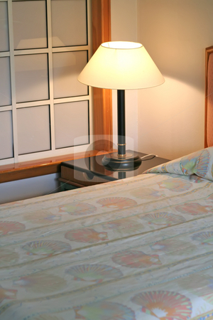 To use this stock image in your creative project, please select the size you need over to the right and click the "Add to Cart" button.
Your downloaded image will come with the Cutcaster watermark removed so don’t worry about the watermark you see on this page. Resort bedroom stock photo, Bedroom in a resort hotel lamp and bed by Kheng Guan Toh