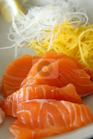 To use this stock image in your creative project, please select the size you need over to the right and click the "Add to Cart" button.
Your downloaded image will come with the Cutcaster watermark removed so don’t worry about the watermark you see on this page. Salmon sashimi stock photo, Arrangement of salmon sashimi raw japanese seafood by Kheng Guan Toh