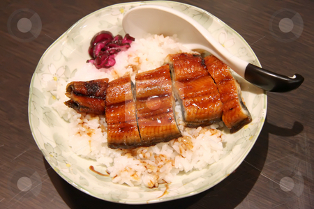 To use this stock image in your creative project, please select the size you need over to the right and click the "Add to Cart" button.
Your downloaded image will come with the Cutcaster watermark removed so don’t worry about the watermark you see on this page. Unagi with rice stock photo, Unagi, grilled eel with rice, traditional japanese cuisine by Kheng Guan Toh
