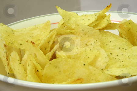 To use this stock image in your creative project, please select the size you need over to the right and click the "Add to Cart" button.
Your downloaded image will come with the Cutcaster watermark removed so don’t worry about the watermark you see on this page. Potato chips stock photo, Seasoned fried potato chips in white bowl by Kheng Guan Toh