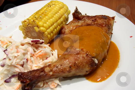 To use this stock image in your creative project, please select the size you need over to the right and click the "Add to Cart" button.
Your downloaded image will come with the Cutcaster watermark removed so don’t worry about the watermark you see on this page. Roast chicken stock photo, Roast chicken leg with corn on the cob and coleslaw by Kheng Guan Toh