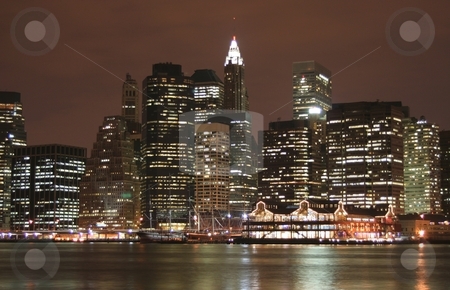 To use this stock image in your creative project, please select the size you need over to the right and click the "Add to Cart" button.
Your downloaded image will come with the Cutcaster watermark removed so don’t worry about the watermark you see on this page. NYC Skyline stock photo, A photo of the New York City Skyline (lower Manhattan) by Ryan Bouie