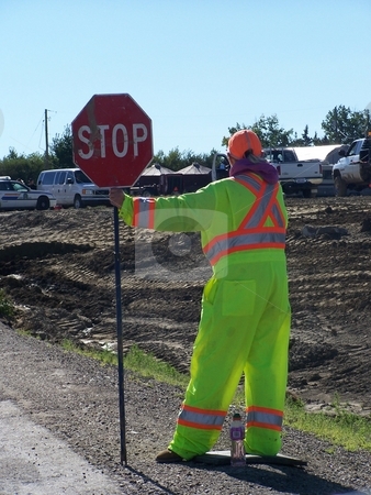 To use this stock image in your creative project, please select the size you need over to the right and click the "Add to Cart" button.
Your downloaded image will come with the Cutcaster watermark removed so don’t worry about the watermark you see on this page. Woman Flagman On Road Construction Site stock photo, Woman Flagman On Road Construction Site by CHERYL LAFOND