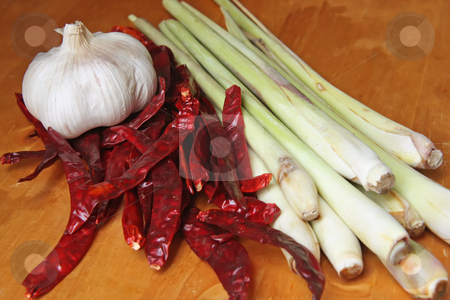 To use this stock image in your creative project, please select the size you need over to the right and click the "Add to Cart" button.
Your downloaded image will come with the Cutcaster watermark removed so don’t worry about the watermark you see on this page. Asian cooking ingredients stock photo, Garlic, dried chillis, and lemongrass, asian cooking ingredients by Kheng Guan Toh
