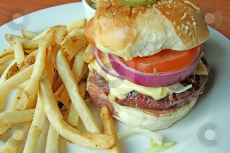 To use this stock image in your creative project, please select the size you need over to the right and click the "Add to Cart" button.
Your downloaded image will come with the Cutcaster watermark removed so don’t worry about the watermark you see on this page. Fancy cheeseburger stock photo, Fancy cheeseburger with french fries served on white plate in restaurant by Kheng Guan Toh