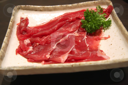 To use this stock image in your creative project, please select the size you need over to the right and click the "Add to Cart" button.
Your downloaded image will come with the Cutcaster watermark removed so don’t worry about the watermark you see on this page. Sliced raw beef stock photo, Plate or thinly sliced raw beef for japanese shabus habu by Kheng Guan Toh
