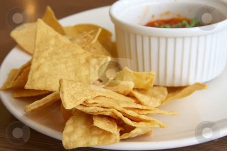 To use this stock image in your creative project, please select the size you need over to the right and click the "Add to Cart" button.
Your downloaded image will come with the Cutcaster watermark removed so don’t worry about the watermark you see on this page. Nachos and salsa stock photo, Nachos and salsa mexican snack food fried corn chips by Kheng Guan Toh