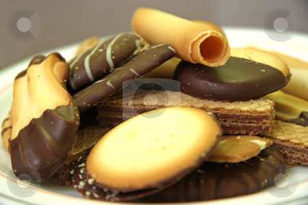 To use this stock image in your creative project, please select the size you need over to the right and click the "Add to Cart" button.
Your downloaded image will come with the Cutcaster watermark removed so don’t worry about the watermark you see on this page. Assorted cookies stock photo, Assorted decorated cookies and wafers chocolate covered by Kheng Guan Toh