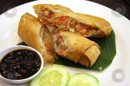 To use this stock image in your creative project, please select the size you need over to the right and click the "Add to Cart" button.
Your downloaded image will come with the Cutcaster watermark removed so don’t worry about the watermark you see on this page. Fried springrolls stock photo, Fried chinese spring rolls traditional vegetable wraps by Kheng Guan Toh