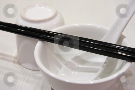 To use this stock image in your creative project, please select the size you need over to the right and click the "Add to Cart" button.
Your downloaded image will come with the Cutcaster watermark removed so don’t worry about the watermark you see on this page. Chinese porcelain stock photo, White porcelain restaurant setting chinese dishes by Kheng Guan Toh