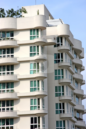 To use this stock image in your creative project, please select the size you need over to the right and click the "Add to Cart" button.
Your downloaded image will come with the Cutcaster watermark removed so don’t worry about the watermark you see on this page. Modern apartment stock photo, Modern apartment buildings with windows in singapore by Kheng Guan Toh