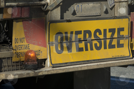 To use this stock image in your creative project, please select the size you need over to the right and click the "Add to Cart" button.
Your downloaded image will come with the Cutcaster watermark removed so don’t worry about the watermark you see on this page. Oversize load stock photo, Sign on the back of an oversize truck by Stephen Gibson