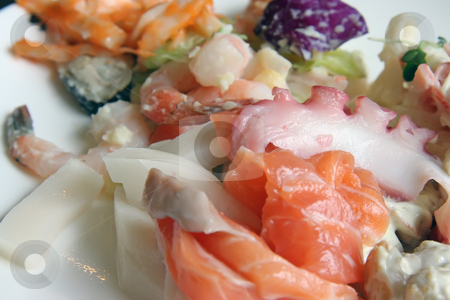 To use this stock image in your creative project, please select the size you need over to the right and click the "Add to Cart" button.
Your downloaded image will come with the Cutcaster watermark removed so don’t worry about the watermark you see on this page. Fresh sashimi stock photo, Fresh sashimi platter featuring octopus salmon and prawns by Kheng Guan Toh