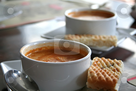 To use this stock image in your creative project, please select the size you need over to the right and click the "Add to Cart" button.
Your downloaded image will come with the Cutcaster watermark removed so don’t worry about the watermark you see on this page. Lobster bisque stock photo, Bowl of lobster bisque in white bowl casual restaurant setting by Kheng Guan Toh