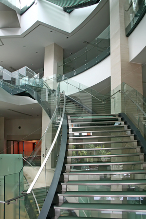 To use this stock image in your creative project, please select the size you need over to the right and click the "Add to Cart" button.
Your downloaded image will come with the Cutcaster watermark removed so don’t worry about the watermark you see on this page. Modern staircase stock photo, Modern glass and steel piral staircase with skylight by Kheng Guan Toh