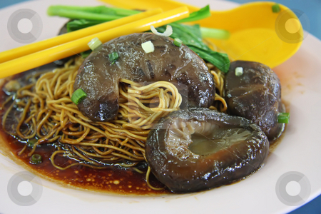 To use this stock image in your creative project, please select the size you need over to the right and click the "Add to Cart" button.
Your downloaded image will come with the Cutcaster watermark removed so don’t worry about the watermark you see on this page. Chinese mushroom noodles stock photo, Traditional chinese noodles with mushrooms by Kheng Guan Toh