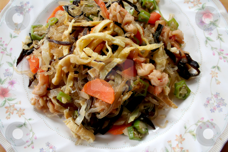 To use this stock image in your creative project, please select the size you need over to the right and click the "Add to Cart" button.
Your downloaded image will come with the Cutcaster watermark removed so don’t worry about the watermark you see on this page. Chinese glass noodles stock photo, Chinese fried glass noodles with prawns traditional cuisine by Kheng Guan Toh