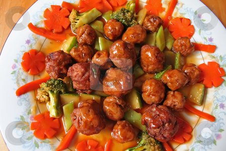 To use this stock image in your creative project, please select the size you need over to the right and click the "Add to Cart" button.
Your downloaded image will come with the Cutcaster watermark removed so don’t worry about the watermark you see on this page. Meatballs and vegetables stock photo, Meatballs with vegetables and sauce on a plate by Kheng Guan Toh