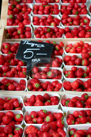 To use this stock image in your creative project, please select the size you need over to the right and click the "Add to Cart" button.
Your downloaded image will come with the Cutcaster watermark removed so don’t worry about the watermark you see on this page. Fresh strawberries stock photo, Fresh strawberries in baskets for sale in a market by Kheng Guan Toh