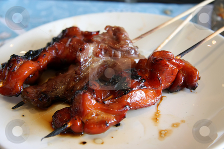 To use this stock image in your creative project, please select the size you need over to the right and click the "Add to Cart" button.
Your downloaded image will come with the Cutcaster watermark removed so don’t worry about the watermark you see on this page. Grilled meat stock photo, Assorted grilled meat skewered on wooden sticks by Kheng Guan Toh
