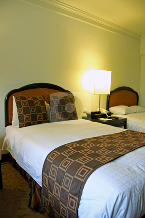 To use this stock image in your creative project, please select the size you need over to the right and click the "Add to Cart" button.
Your downloaded image will come with the Cutcaster watermark removed so don’t worry about the watermark you see on this page. Hotel bedroom stock photo, Bedroom of a five star business hotel with made bed by Kheng Guan Toh
