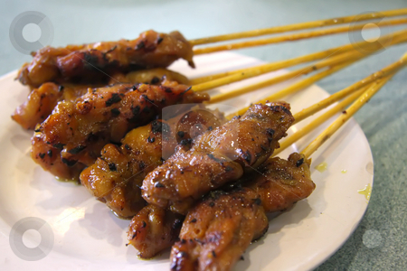 To use this stock image in your creative project, please select the size you need over to the right and click the "Add to Cart" button.
Your downloaded image will come with the Cutcaster watermark removed so don’t worry about the watermark you see on this page. Satay skewers stock photo, Satay meat skewers on wooden sticks traditional malaysian cuisine by Kheng Guan Toh