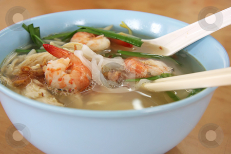 To use this stock image in your creative project, please select the size you need over to the right and click the "Add to Cart" button.
Your downloaded image will come with the Cutcaster watermark removed so don’t worry about the watermark you see on this page. Chinese prawn noodle soup stock photo, Chinese noodle soup with prawns in bowl by Kheng Guan Toh