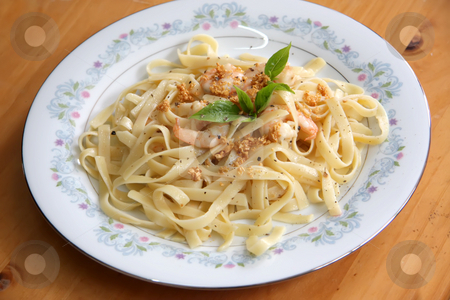 To use this stock image in your creative project, please select the size you need over to the right and click the "Add to Cart" button.
Your downloaded image will come with the Cutcaster watermark removed so don’t worry about the watermark you see on this page. Pasta ala oglio stock photo, Pasta ala oglio with shrimp Italian cuisine by Kheng Guan Toh