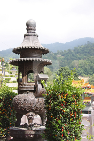 To use this stock image in your creative project, please select the size you need over to the right and click the "Add to Cart" button.
Your downloaded image will come with the Cutcaster watermark removed so don’t worry about the watermark you see on this page. Chinese temple offerings stock photo, Metal offering burner in Chinese temple courtyard by Kheng Guan Toh