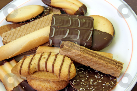 To use this stock image in your creative project, please select the size you need over to the right and click the "Add to Cart" button.
Your downloaded image will come with the Cutcaster watermark removed so don’t worry about the watermark you see on this page. Assorted cookies stock photo, Assorted decorated cookies and wafers chocolate covered by Kheng Guan Toh