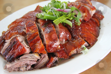 To use this stock image in your creative project, please select the size you need over to the right and click the "Add to Cart" button.
Your downloaded image will come with the Cutcaster watermark removed so don’t worry about the watermark you see on this page. Roast duck stock photo, Roast duck chinese cuisine sliced portions on plate by Kheng Guan Toh