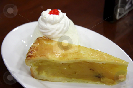 To use this stock image in your creative project, please select the size you need over to the right and click the "Add to Cart" button.
Your downloaded image will come with the Cutcaster watermark removed so don’t worry about the watermark you see on this page. Apple pie with ice cream stock photo, Apple pie ala mode with vanilla ice cream by Kheng Guan Toh