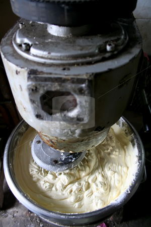 To use this stock image in your creative project, please select the size you need over to the right and click the "Add to Cart" button.
Your downloaded image will come with the Cutcaster watermark removed so don’t worry about the watermark you see on this page. Bread factory stock photo, Industrial dough mixing machine in bread factory by Kheng Guan Toh