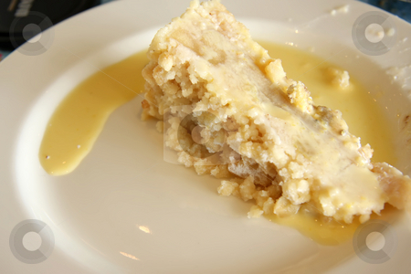 To use this stock image in your creative project, please select the size you need over to the right and click the "Add to Cart" button.
Your downloaded image will come with the Cutcaster watermark removed so don’t worry about the watermark you see on this page. Apple crumble stock photo, Slice of apple crumble with custard on plate by Kheng Guan Toh