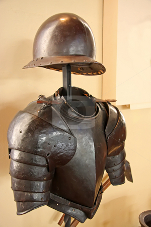 To use this stock image in your creative project, please select the size you need over to the right and click the "Add to Cart" button.
Your downloaded image will come with the Cutcaster watermark removed so don’t worry about the watermark you see on this page. Ancient armor stock photo, Museum display of ancient medieval metal armor by Kheng Guan Toh