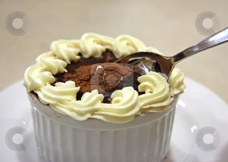 To use this stock image in your creative project, please select the size you need over to the right and click the "Add to Cart" button.
Your downloaded image will come with the Cutcaster watermark removed so don’t worry about the watermark you see on this page. Pudding in ceramic bowl stock photo, Tiramisu chocolate pudding with icing in ceramic bowl by Kheng Guan Toh