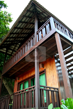 To use this stock image in your creative project, please select the size you need over to the right and click the "Add to Cart" button.
Your downloaded image will come with the Cutcaster watermark removed so don’t worry about the watermark you see on this page. Tropical beach house stock photo, Tropical balineses style resort beach house with balcony by Kheng Guan Toh
