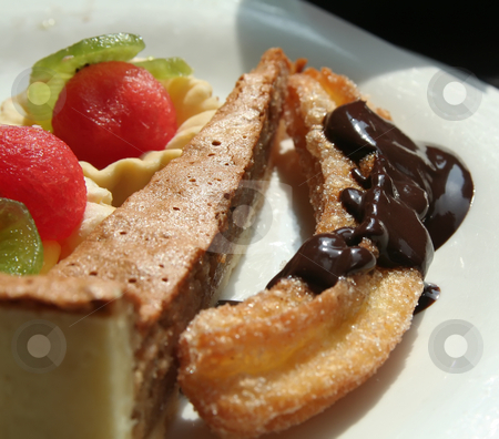 To use this stock image in your creative project, please select the size you need over to the right and click the "Add to Cart" button.
Your downloaded image will come with the Cutcaster watermark removed so don’t worry about the watermark you see on this page. Dessert pastries stock photo, Dessert fruit cups and pastries on white plate by Kheng Guan Toh