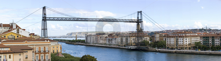 To use this stock image in your creative project, please select the size you need over to the right and click the "Add to Cart" button.
Your downloaded image will come with the Cutcaster watermark removed so don’t worry about the watermark you see on this page. Tourism transportation bridge stock photo, Hanging bridge of portugalete is the oldest hanging bridge of the world and it is unesco patrimony of humanity by Ivan Montero