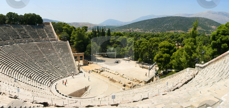To use this stock image in your creative project, please select the size you need over to the right and click the "Add to Cart" button.
Your downloaded image will come with the Cutcaster watermark removed so don’t worry about the watermark you see on this page. Epidaurus or epidauros ancient greek theatre stock photo, Panorama of the famous construction of the ancient theatre of epidaurus by Ivan Montero