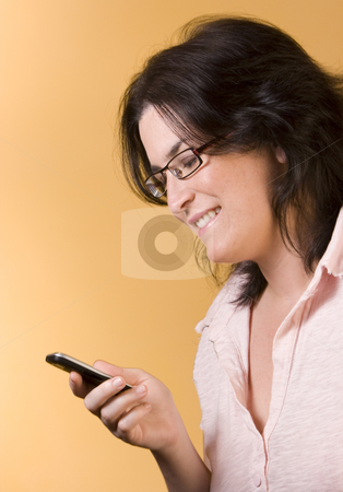 To use this stock image in your creative project, please select the size you need over to the right and click the "Add to Cart" button.
Your downloaded image will come with the Cutcaster watermark removed so don’t worry about the watermark you see on this page. Young woman communication technology stock photo, Young woman by Ivan Montero