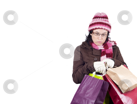 To use this stock image in your creative project, please select the size you need over to the right and click the "Add to Cart" button.
Your downloaded image will come with the Cutcaster watermark removed so don’t worry about the watermark you see on this page. Christmas shopping woman stock photo, Consumerist Christmas girl with bags in a shopping day by Ivan Montero