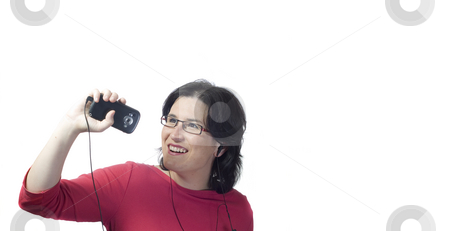 To use this stock image in your creative project, please select the size you need over to the right and click the "Add to Cart" button.
Your downloaded image will come with the Cutcaster watermark removed so don’t worry about the watermark you see on this page. Woman technology mp3 music stock photo, Young woman listening, dancing and singing to music in a mp3 device by Ivan Montero
