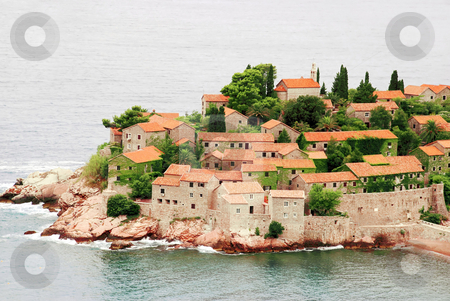 To use this stock image in your creative project, please select the size you need over to the right and click the "Add to Cart" button.
Your downloaded image will come with the Cutcaster watermark removed so don’t worry about the watermark you see on this page. Travel Montenegro stock photo, Island Sveti Stefan in Adriatic sea, stone houses tiled roofs by Julija Sapic