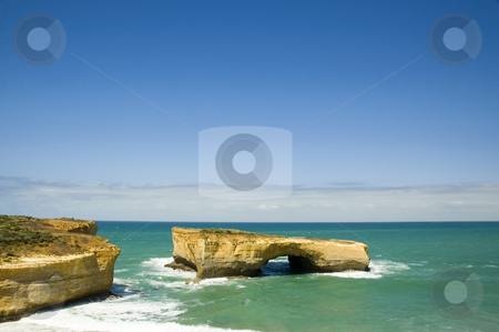 To use this stock image in your creative project, please select the size you need over to the right and click the "Add to Cart" button.
Your downloaded image will come with the Cutcaster watermark removed so don’t worry about the watermark you see on this page. London Arch - Victoria, Australia stock photo, Tourist attraction, The London Arch, located along the Great Ocean Road in Australia. It was formally known as the London Bridge before the collapse of the land portion. by Lee Torrens