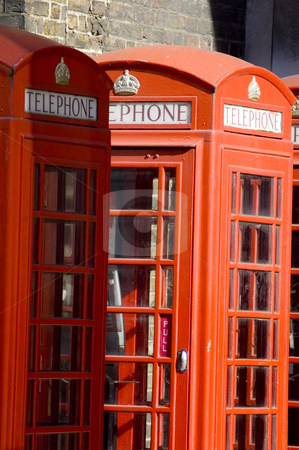 To use this stock image in your creative project, please select the size you need over to the right and click the "Add to Cart" button.
Your downloaded image will come with the Cutcaster watermark removed so don’t worry about the watermark you see on this page. London's Telephone Booths stock photo, Close up of the typical red telephone's booths by Lee Torrens