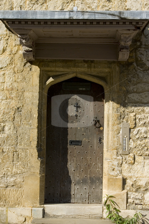 To use this stock image in your creative project, please select the size you need over to the right and click the "Add to Cart" button.
Your downloaded image will come with the Cutcaster watermark removed so don’t worry about the watermark you see on this page. Old Door stock photo, An old door in an old gothic town by Lee Torrens