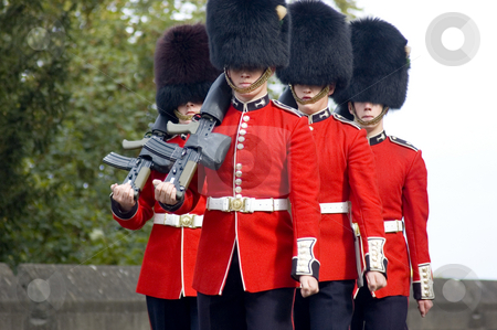 To use this stock image in your creative project, please select the size you need over to the right and click the "Add to Cart" button.
Your downloaded image will come with the Cutcaster watermark removed so don’t worry about the watermark you see on this page. Royal Guards stock photo, Changing of the guards (England) by Lee Torrens