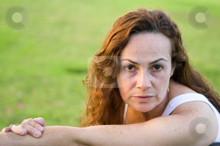 To use this stock image in your creative project, please select the size you need over to the right and click the "Add to Cart" button.
Your downloaded image will come with the Cutcaster watermark removed so don’t worry about the watermark you see on this page. Beautiful woman at the park stock photo, by Jose Wilson Araujo